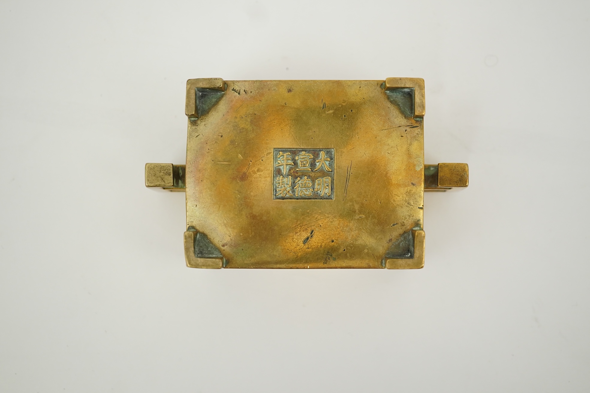 A Chinese bronze rectangular censer, fangding, Xuande mark, 18th century